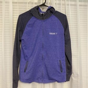 Gymshark zip up sweatshirt. purple and grey